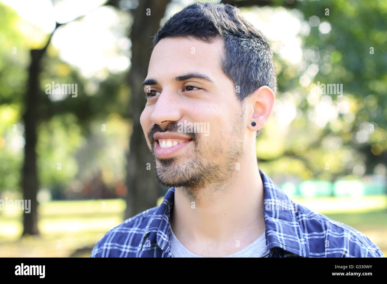 close-up-of-young-handsome-man-in-a-park-stock-photo-alamy