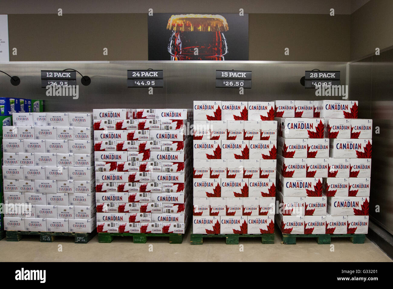 Molson Canadian beer cases on display at a newly opened self serve Beer store in Kingston, Ont., on March 16, 2016. Stock Photo