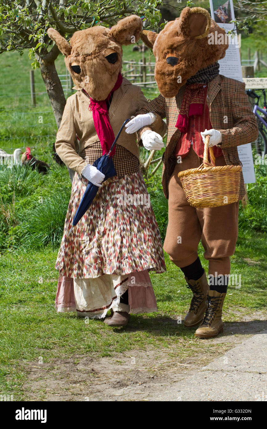 Two people dressed as mice at an arts festival Stock Photo
