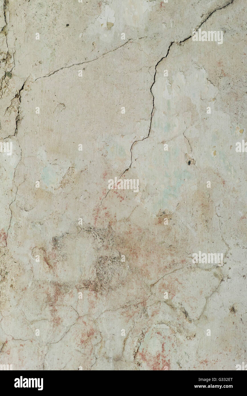 Cracked plaster and paint in a 200yearold house window recess Stock