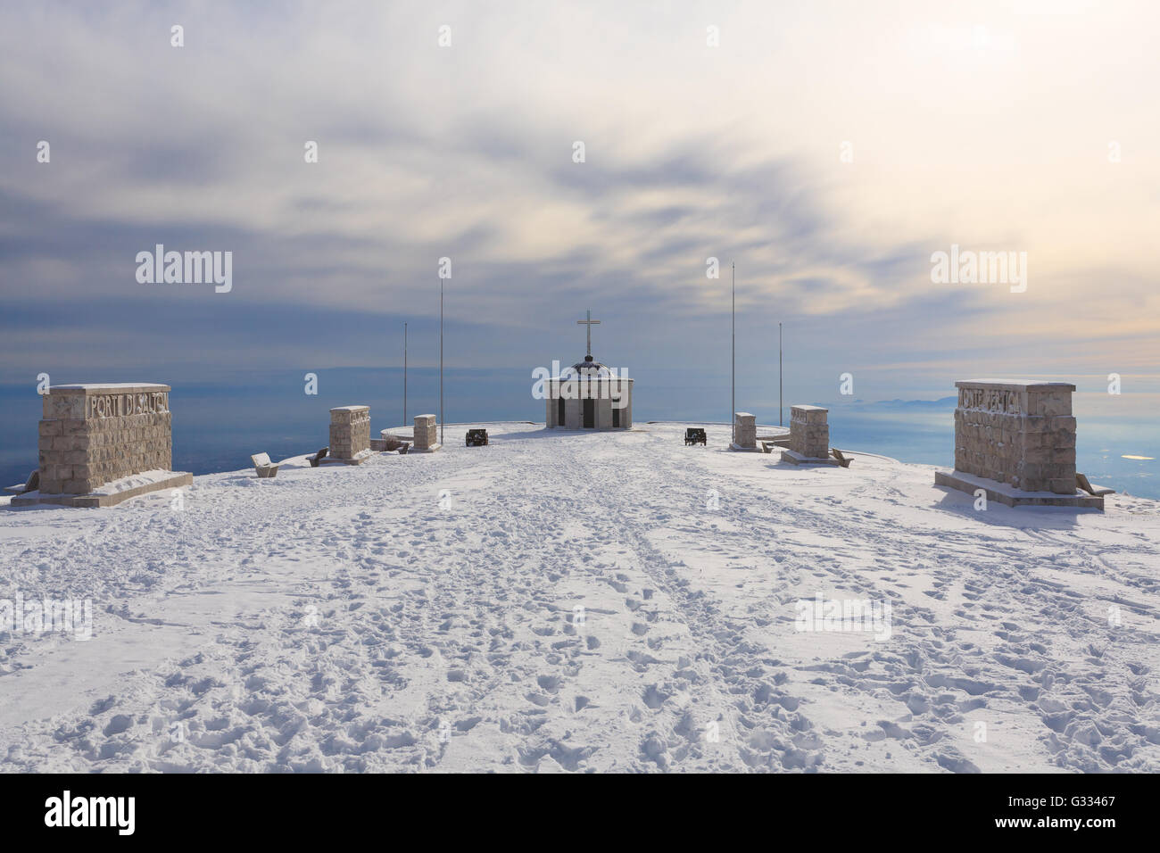 Winter panorama from Italian Alps. First world war memorial building. Snow Stock Photo