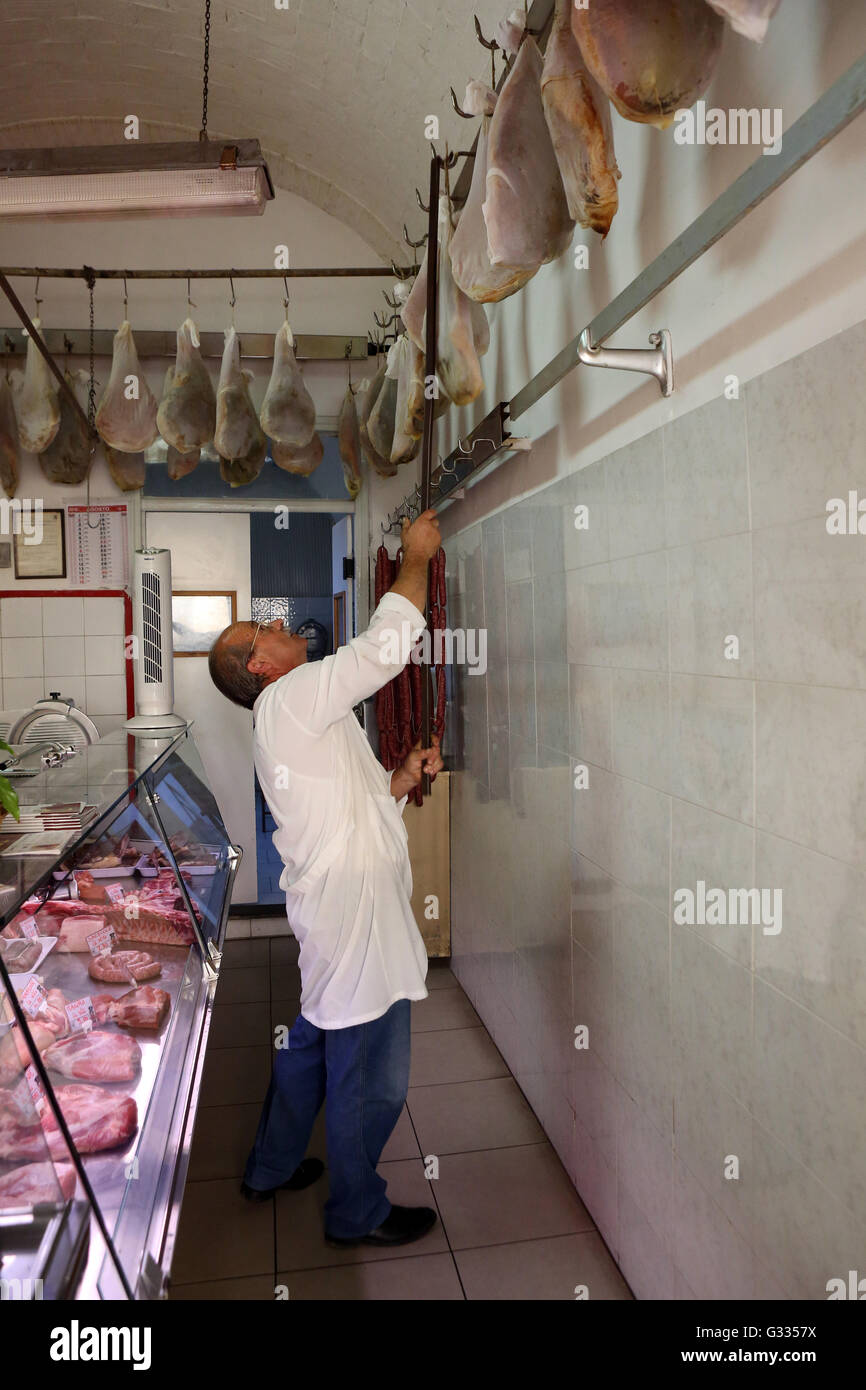 Orvieto, Italy, Fleischer depends a ham on a hook Stock Photo