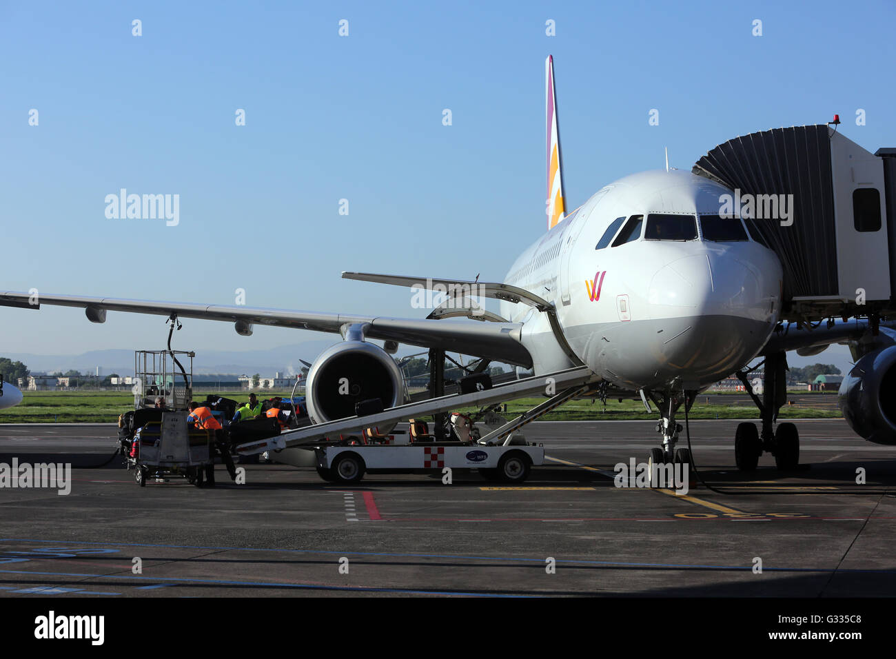 Catania, Italy, suitcases are loaded in an aircraft of the German Wings Stock Photo
