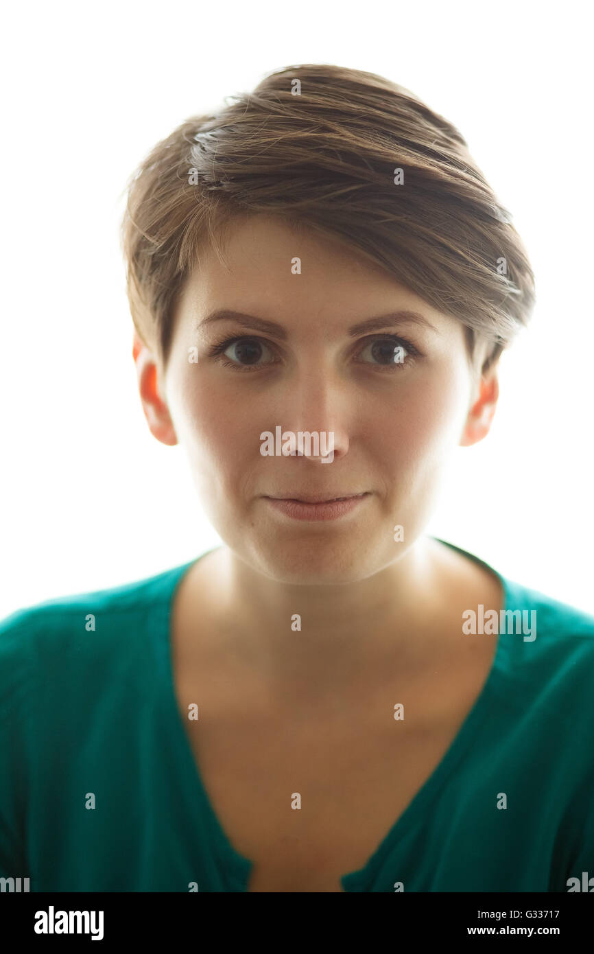 Charming short hair woman without makeup on white background Stock Photo