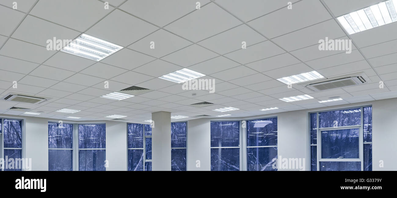 Office, repair and finishing facilities. Ceiling lighting and ventilation. Utilities. Stock Photo