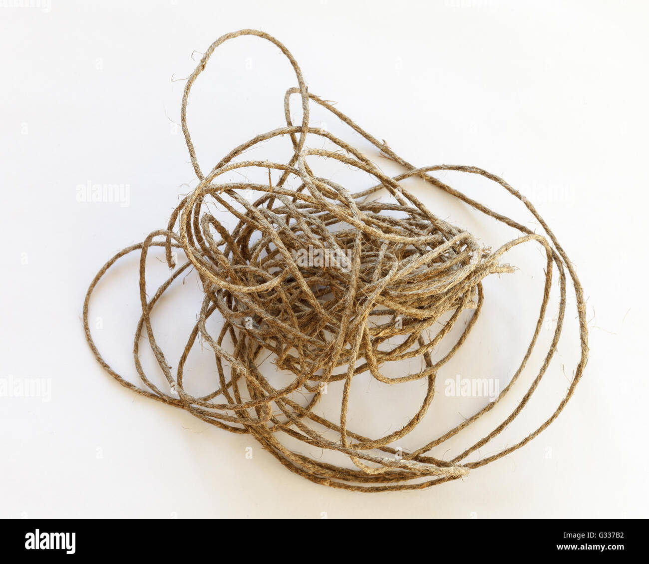 Tangled kraft rope. Close up, top view. Stock Photo