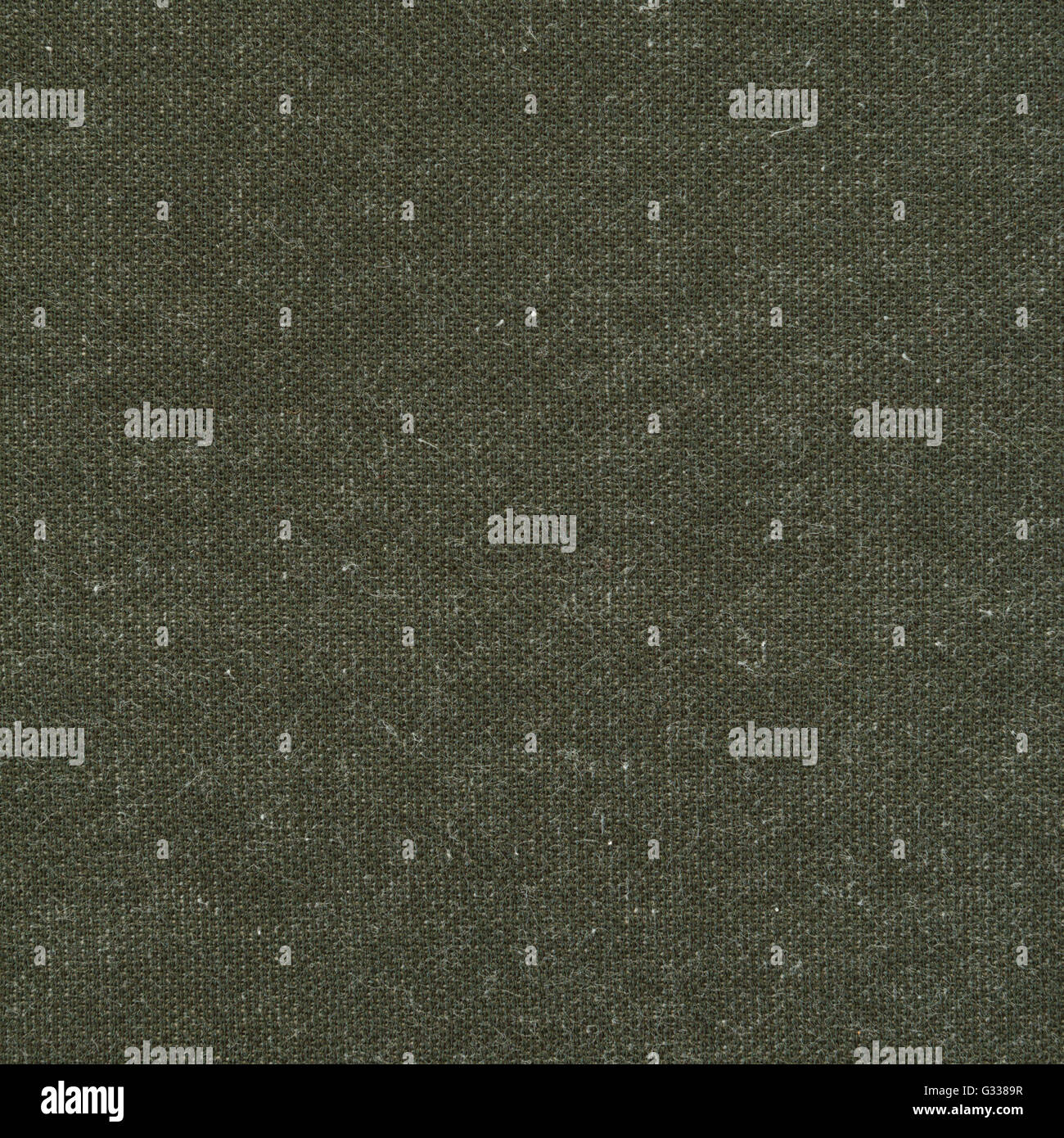 Dark grey green wool knitted fabric texture. Close up fragment of the ...