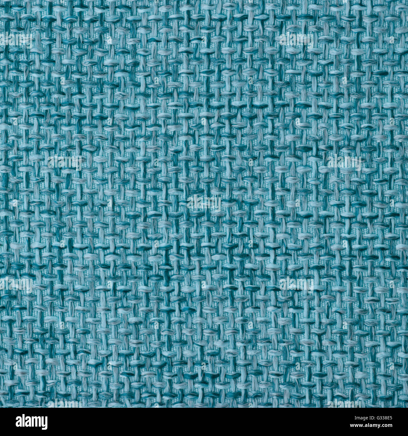 Aqua turquoise blue fabric texture. Close up, top view. Stock Photo