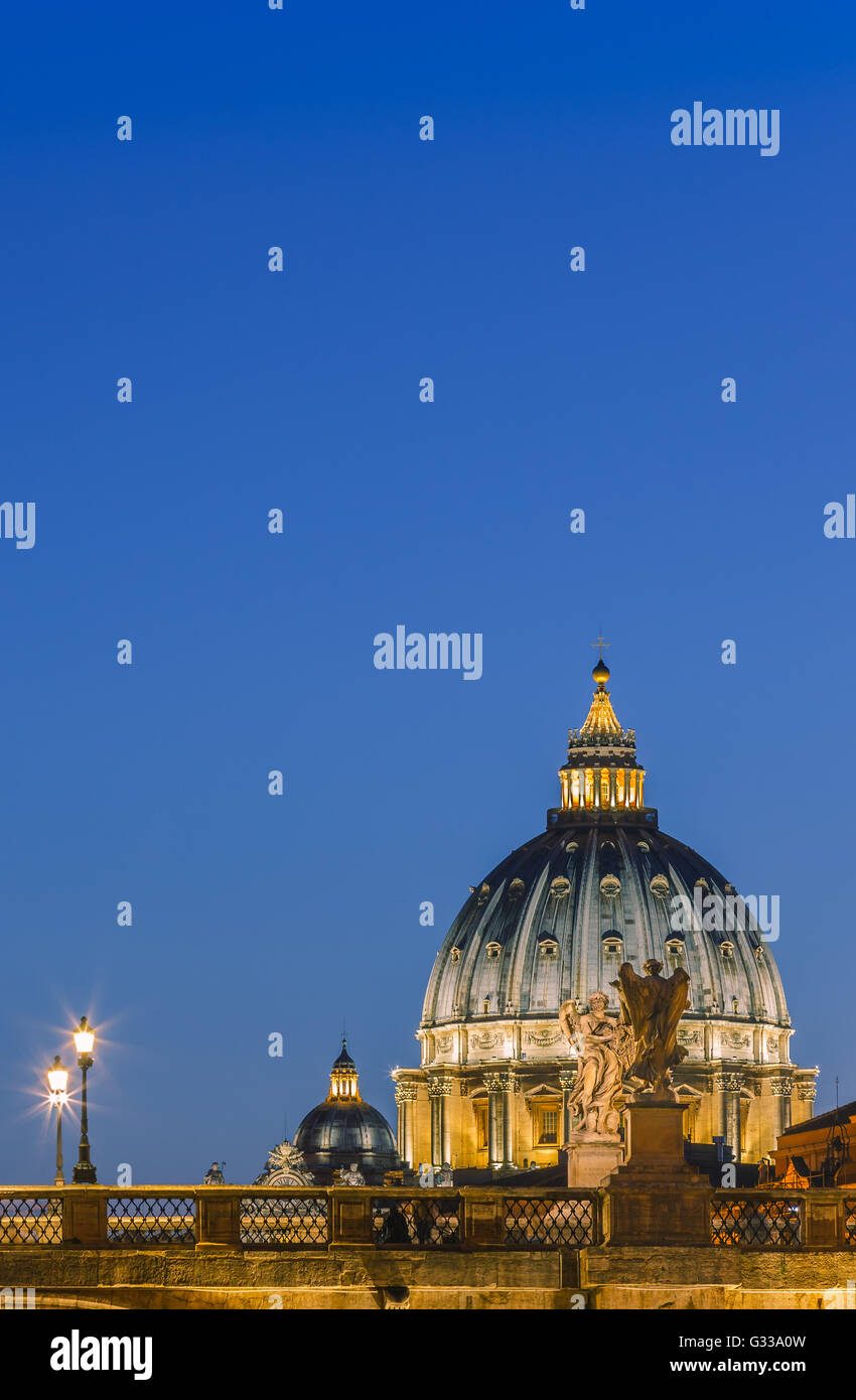 Ponte Sant Angelo and St. Peter's Basilica at dusk, Rome, Italy Stock Photo
