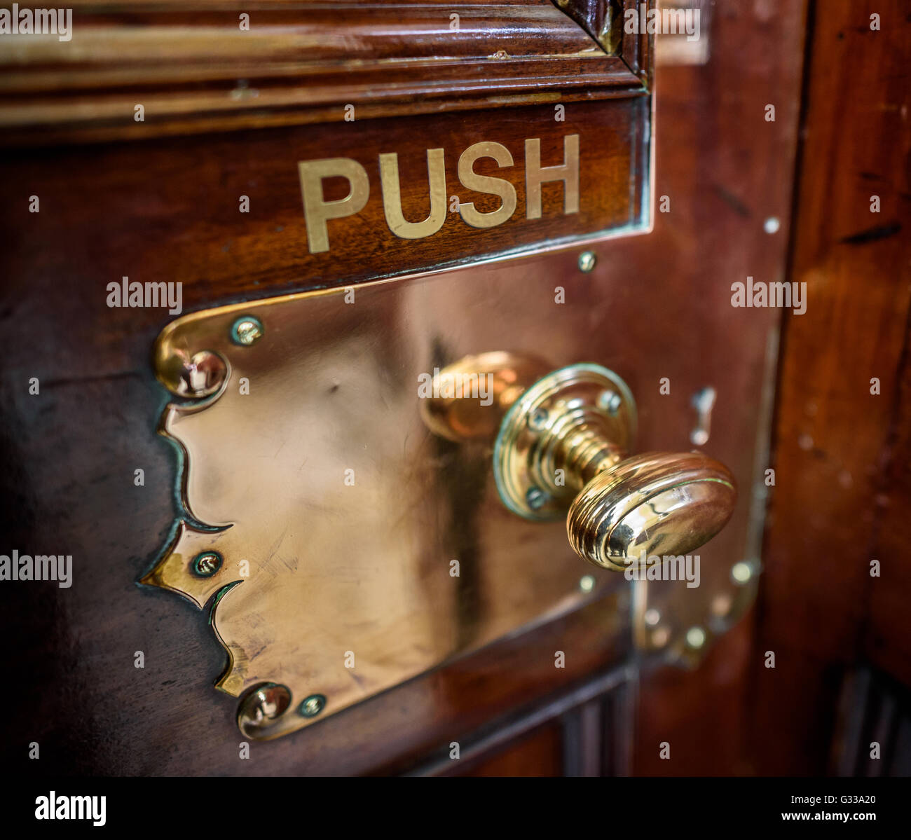 An antique traditional luxurious brass door handle Stock Photo Alamy