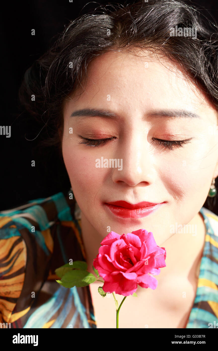 Asian girls are making up face feature Stock Photo