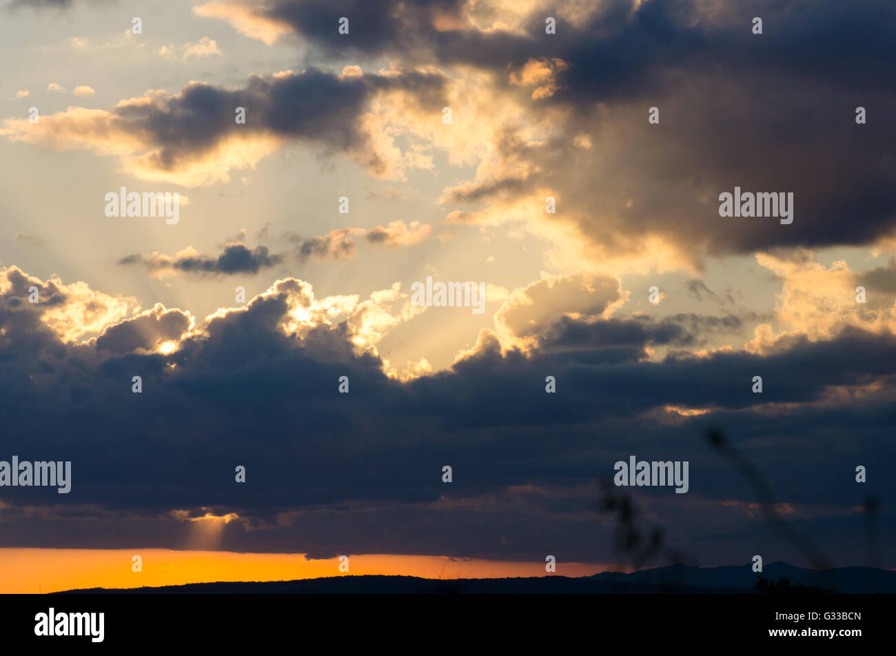 Landscape with clouds on sky at beautiful sunset Stock Photo - Alamy