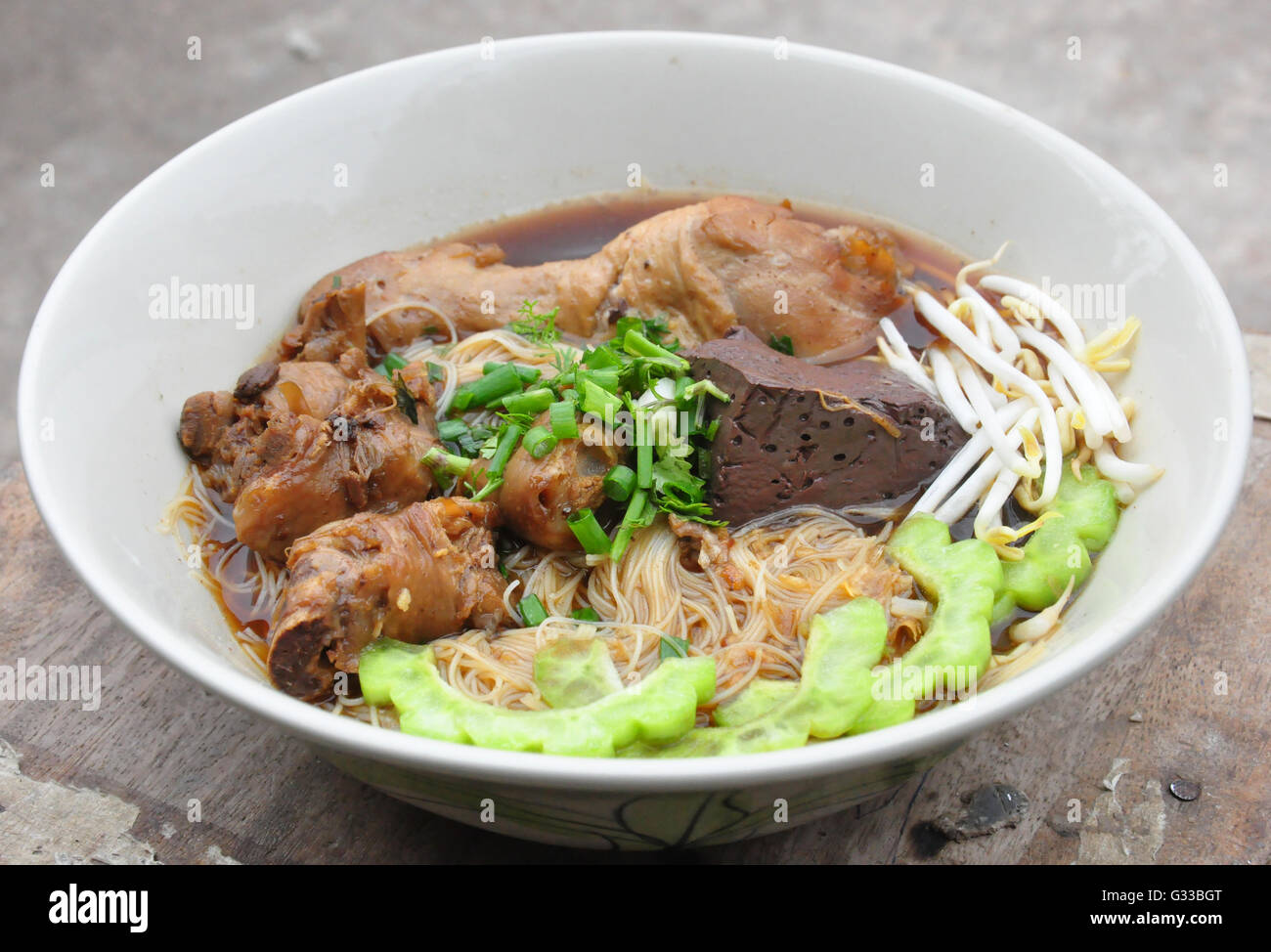 Chicken noodle with bitter gourd Stock Photo Alamy