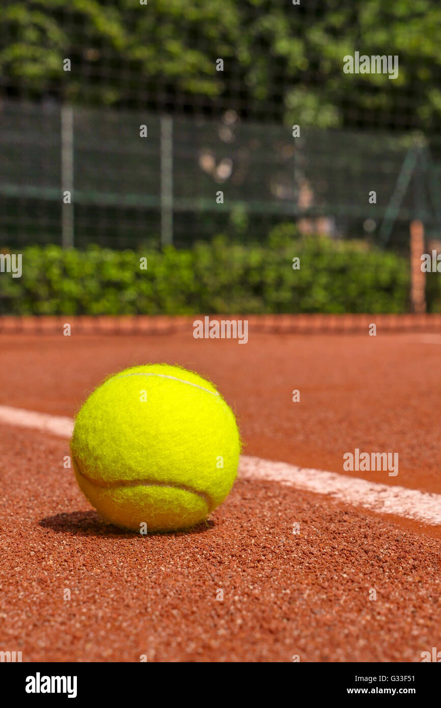 Tennis equipment on clay court Stock Photo Alamy