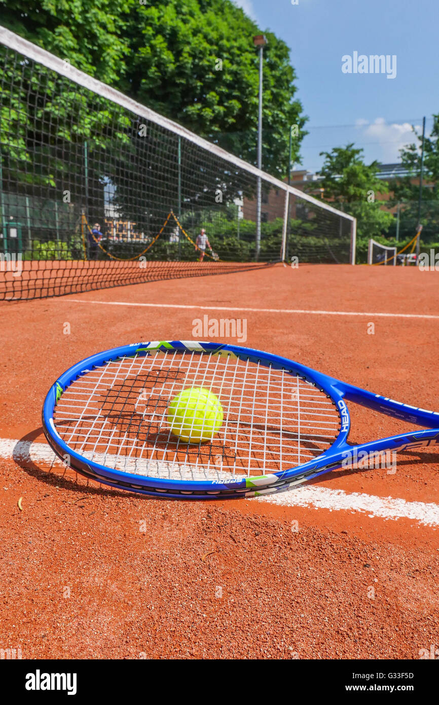 Tennis equipment on clay court Stock Photo Alamy
