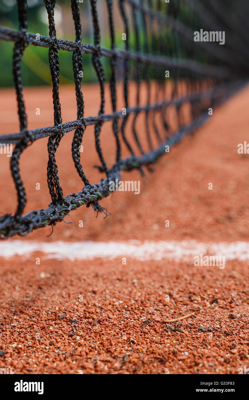 Tennis equipment on clay court Stock Photo Alamy