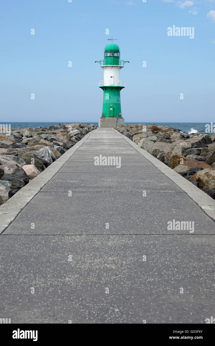 pier with breakwater light or beacon Stock Photo