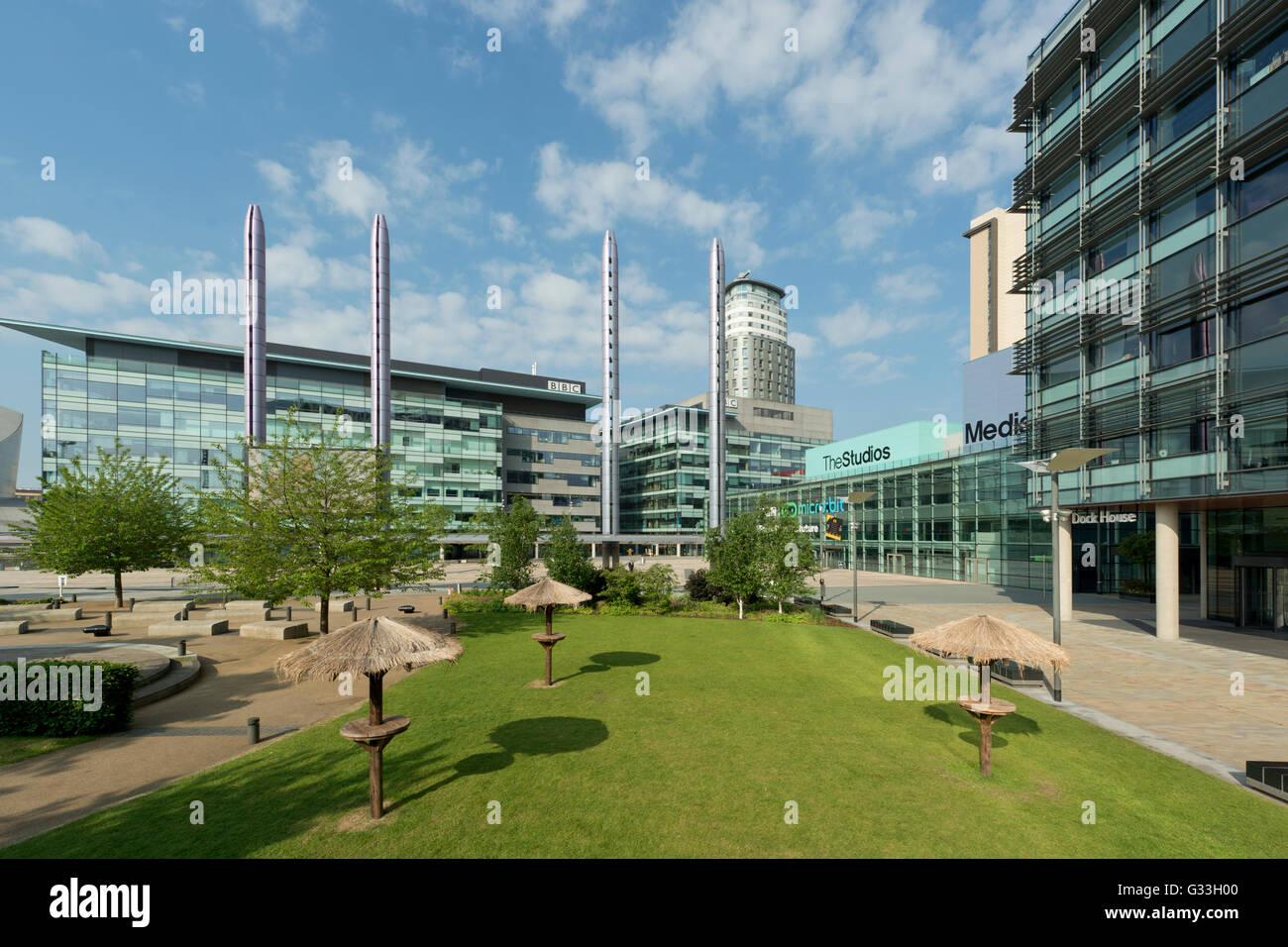 A garden lawn in MediaCityUK, whose tenants list the BBC, ITV, Granada, located in the Salford Quays area of Greater Manchester. Stock Photo