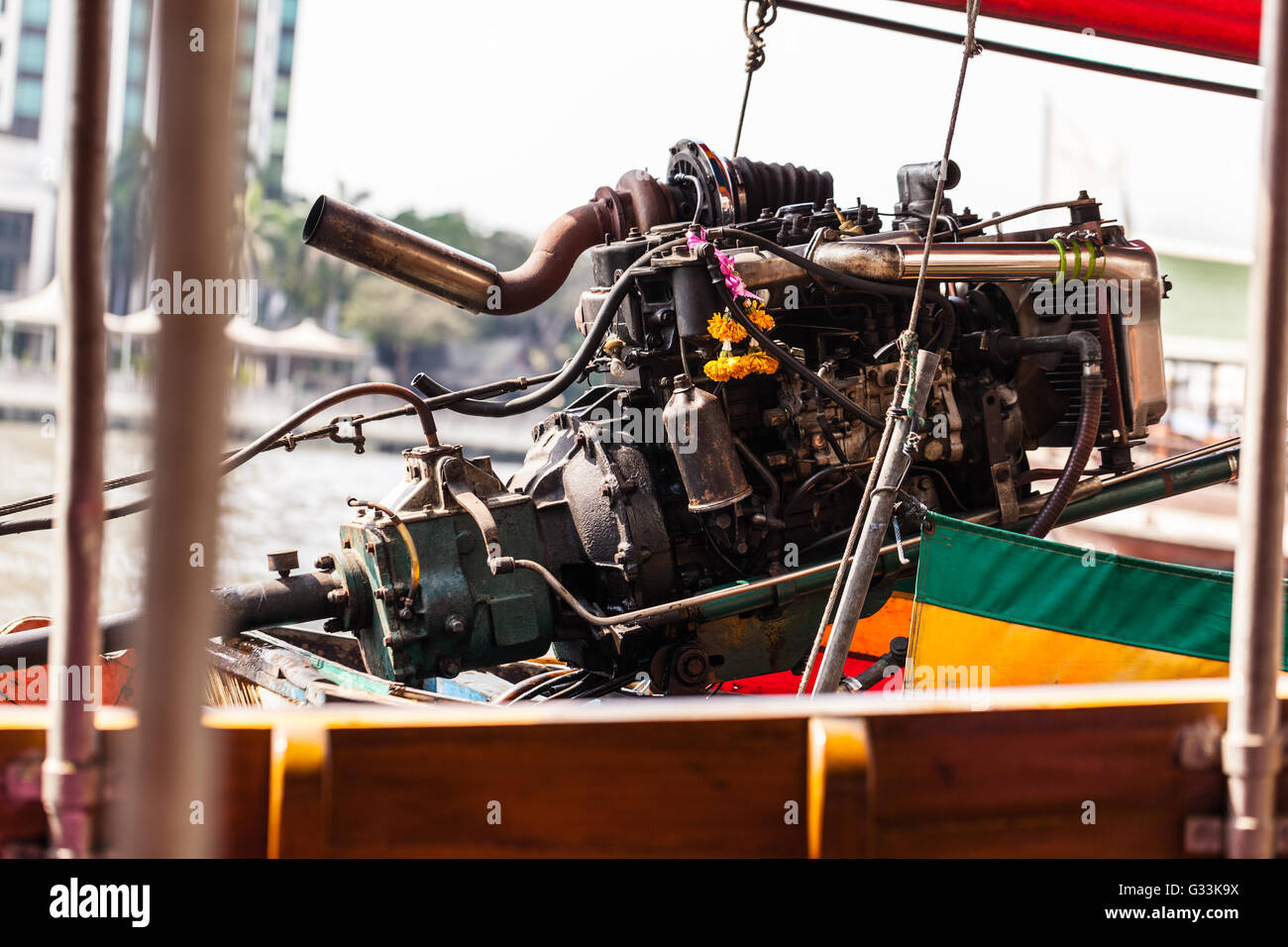 a powerful diesel supercharged engine mounted on a thai long tail speed