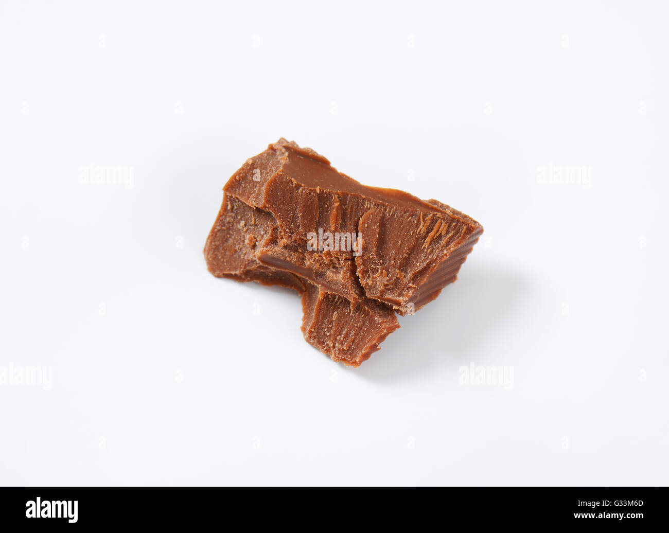 piece of milk chocolate on white background Stock Photo