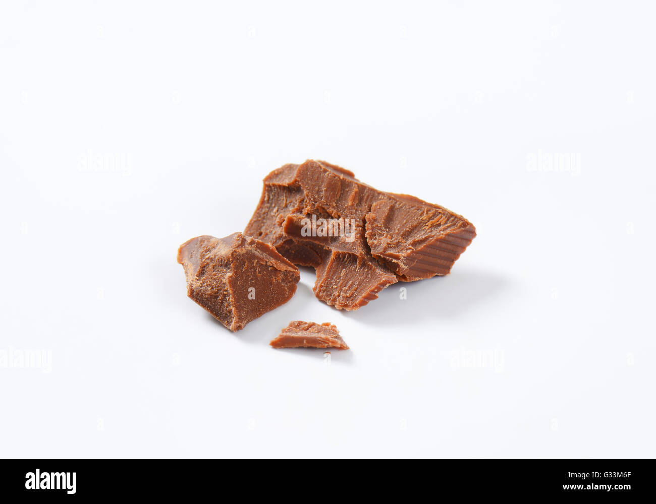 pieces of milk chocolate on white background Stock Photo