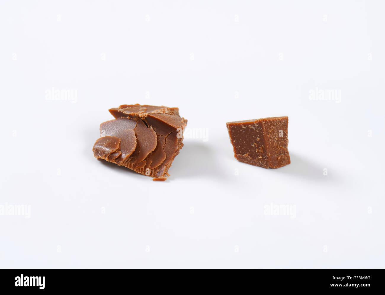 pieces of milk chocolate on white background Stock Photo