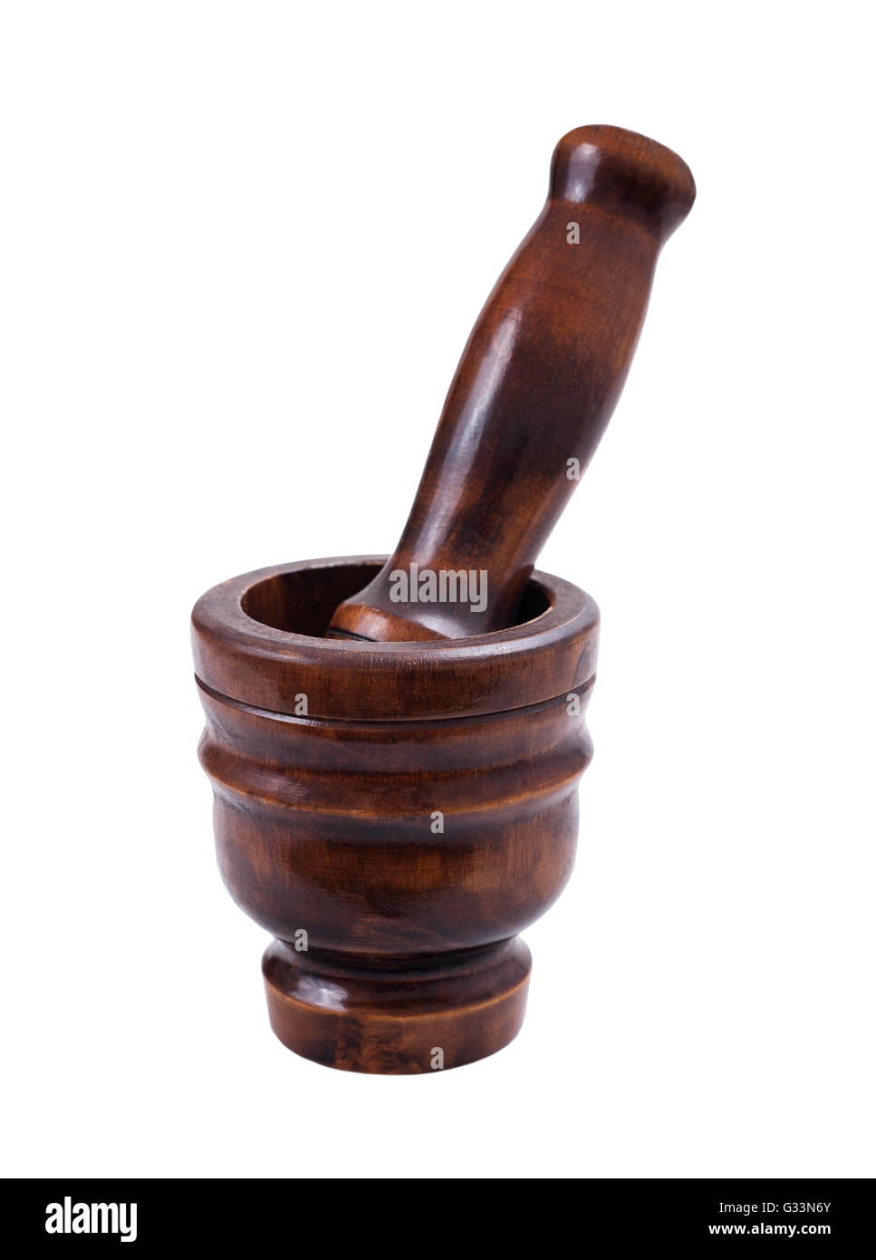 Wooden mortar and pestle on white background Stock Photo