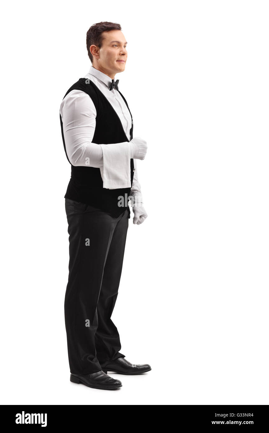 Full length portrait of a young male waiter posing isolated on white background Stock Photo