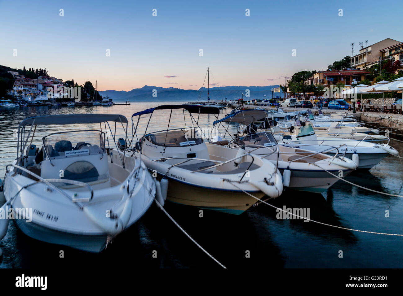 Corfu harbour kassiopi sunset hi-res stock photography and images - Alamy