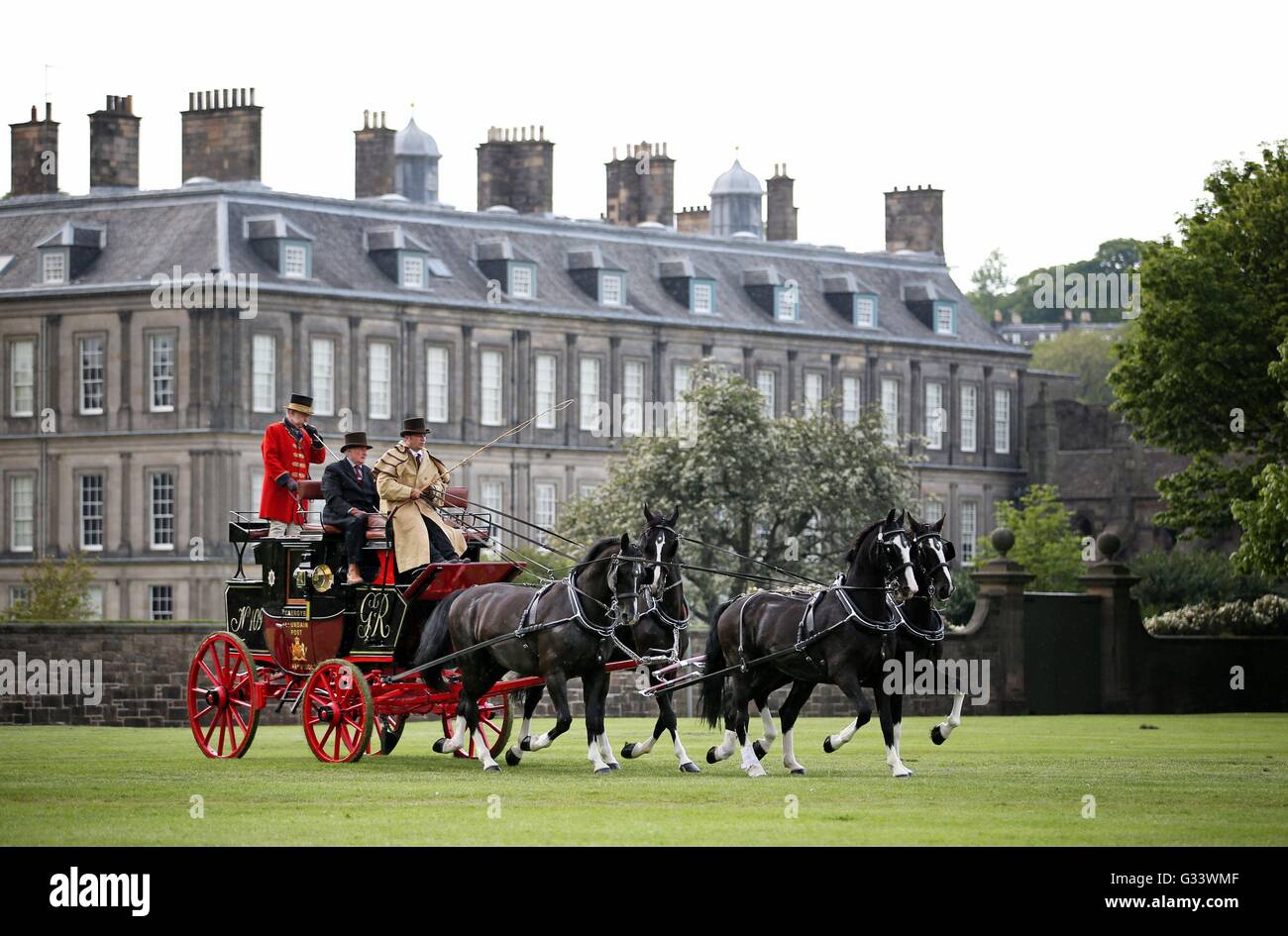 A 19th Century horse-drawn mail coach travels through Holyrood Park in ...