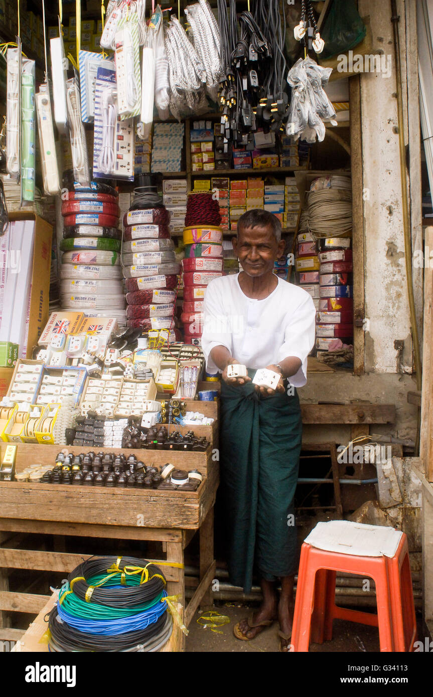 Yangon seller of electrical equipment hires stock photography and