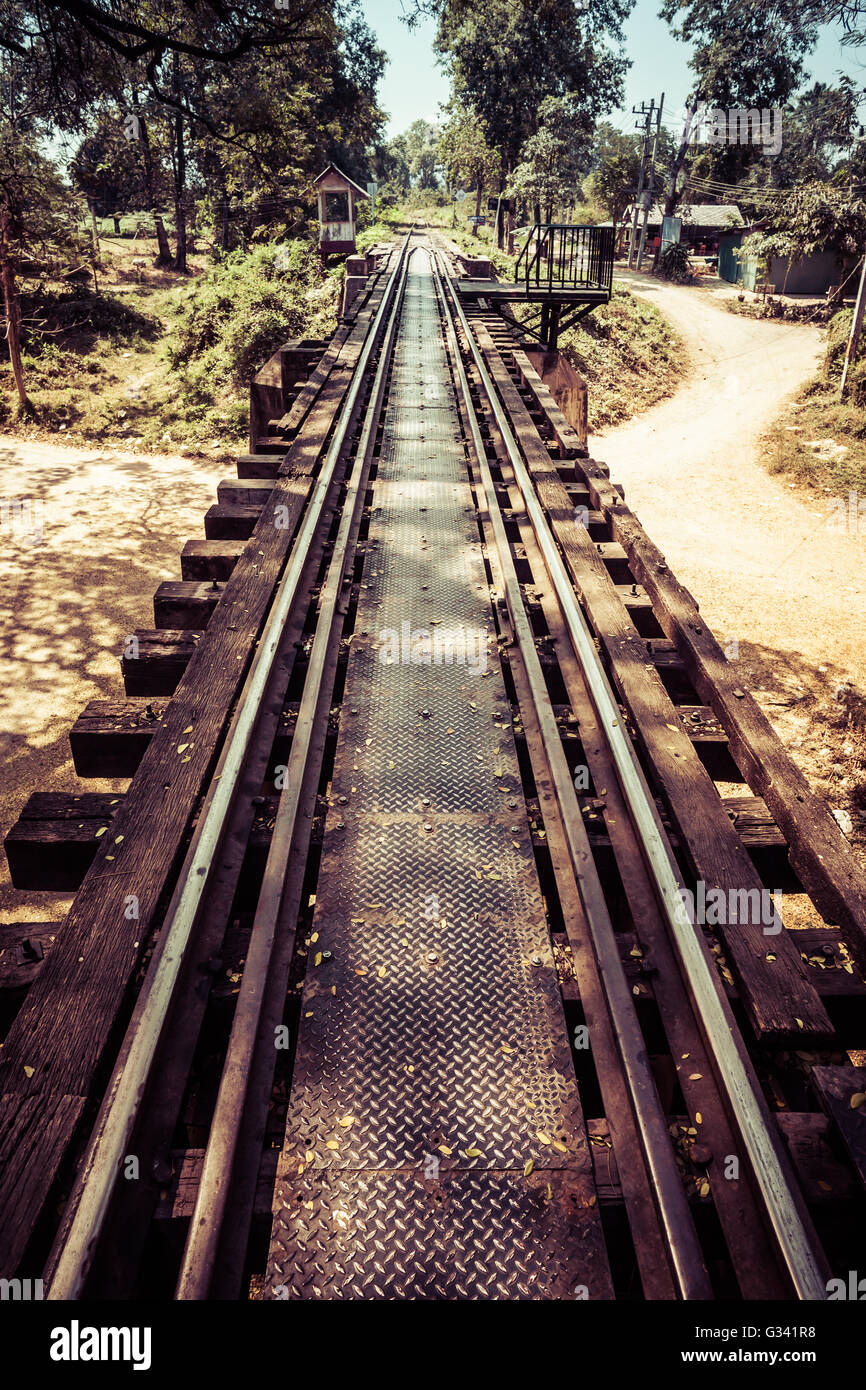 vintage railroad tracks of the famous bridge on the river Kwai in