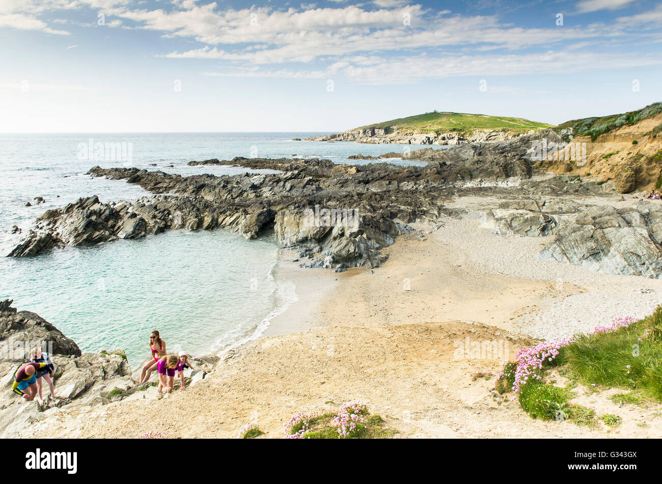 Little Fistral Holidaymakers enjoy the sunny weather at Little Fistral Newquay, Cornwall. Stock Photo