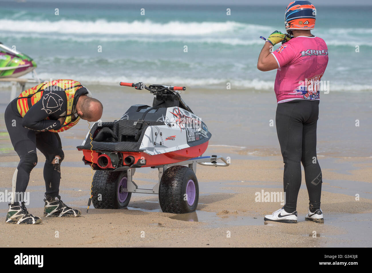 Competitors checking out a Jet-ski at the IFWA World Freeride Championships. Stock Photo