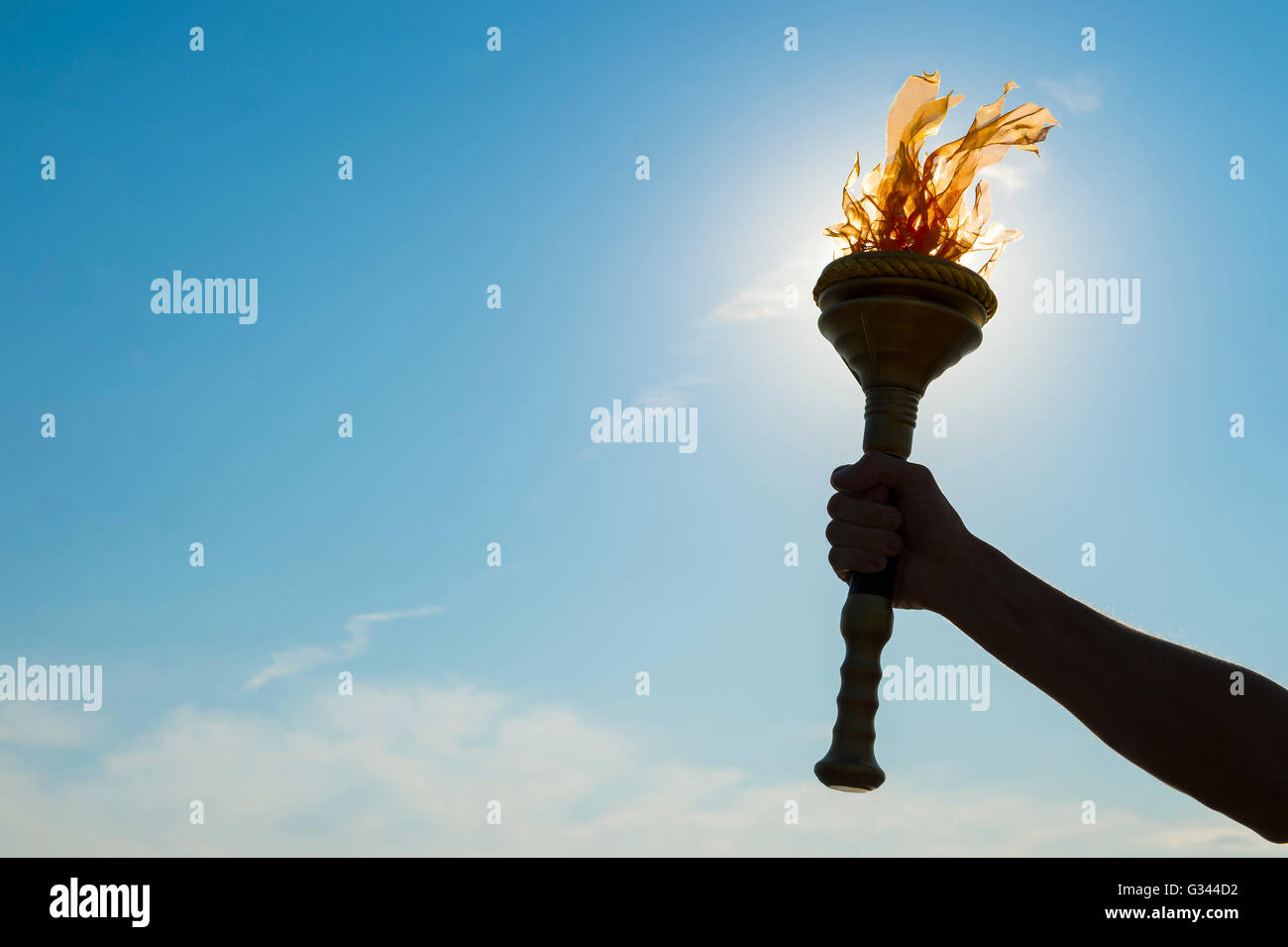 Hand with torch hi-res stock photography and images - Alamy