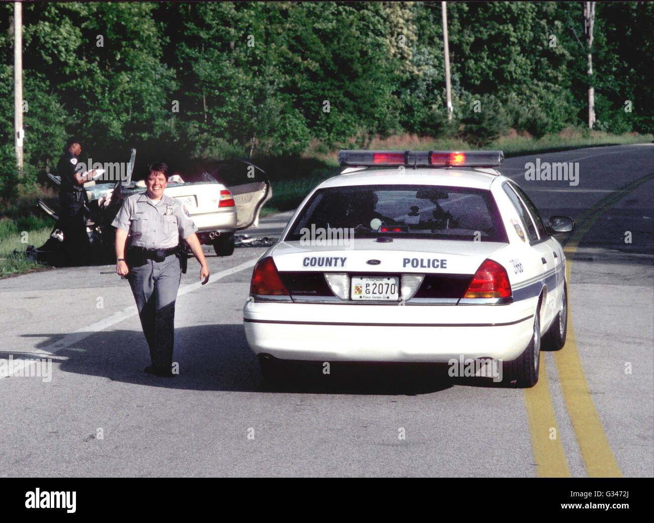 Police officer at scene of accident in Beltsville, Maryland Stock Photo