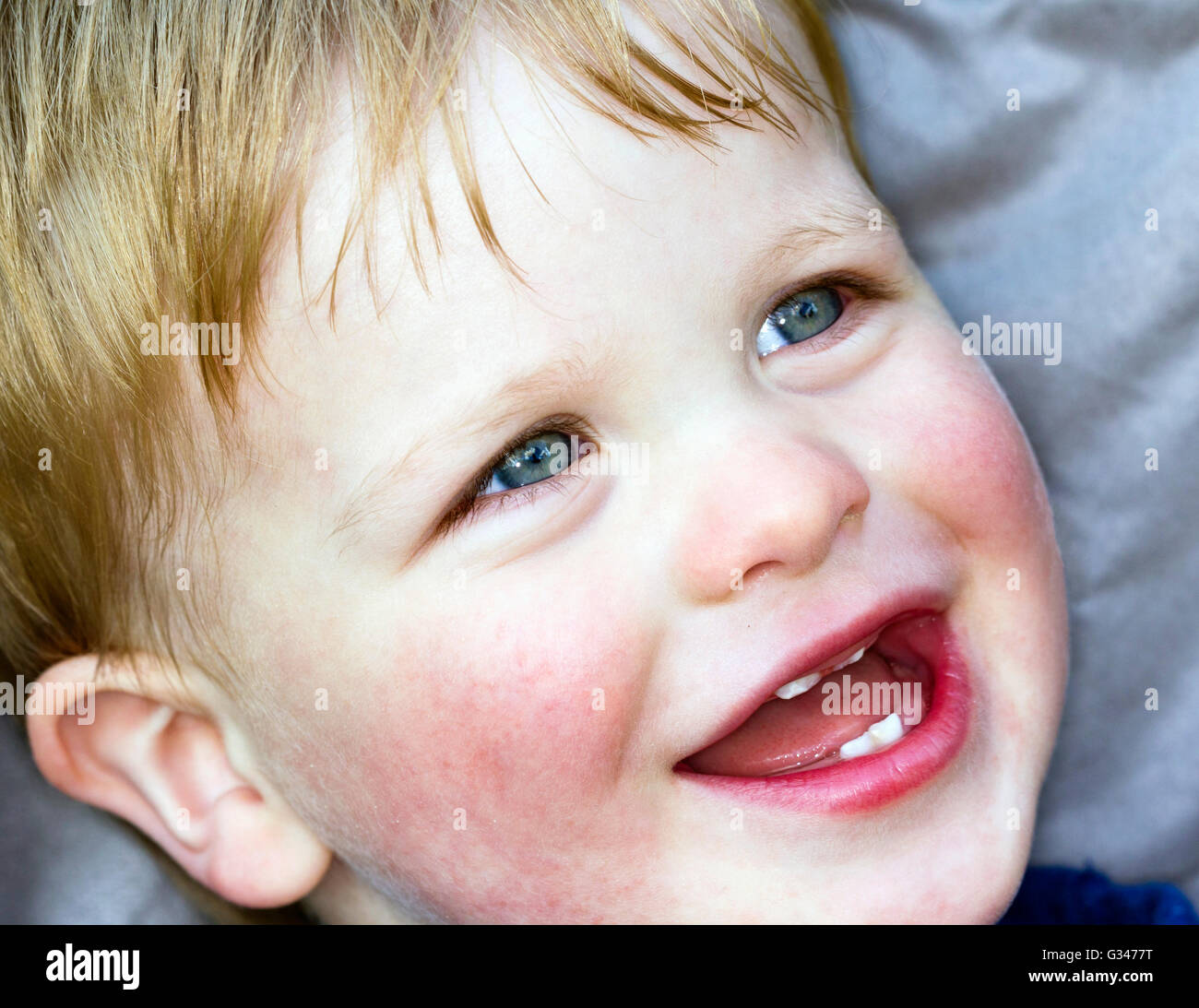 Young boy smiling Stock Photo