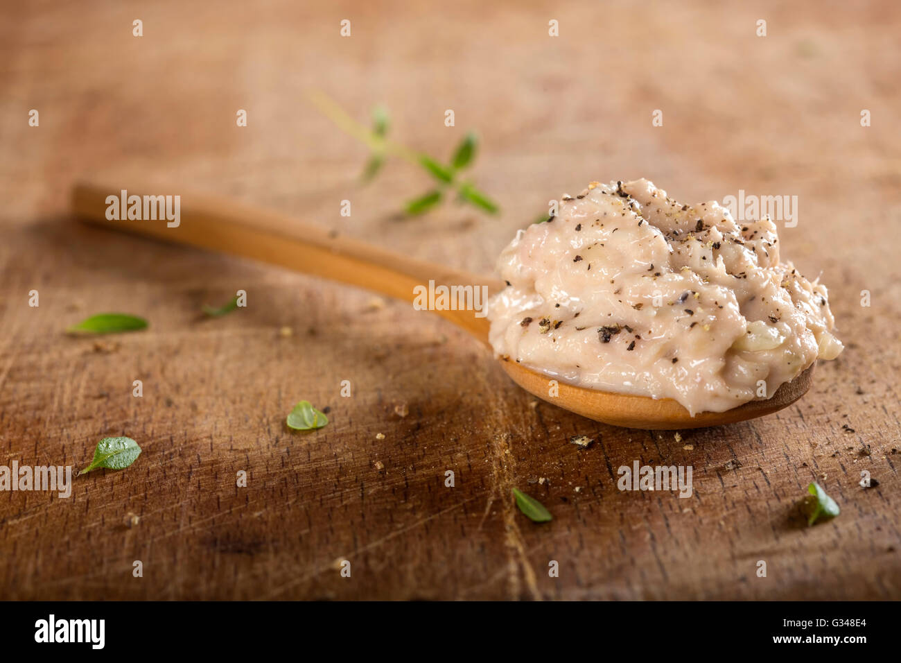 Creamy fish pate in spoon made with tuna, onion and butter Stock Photo