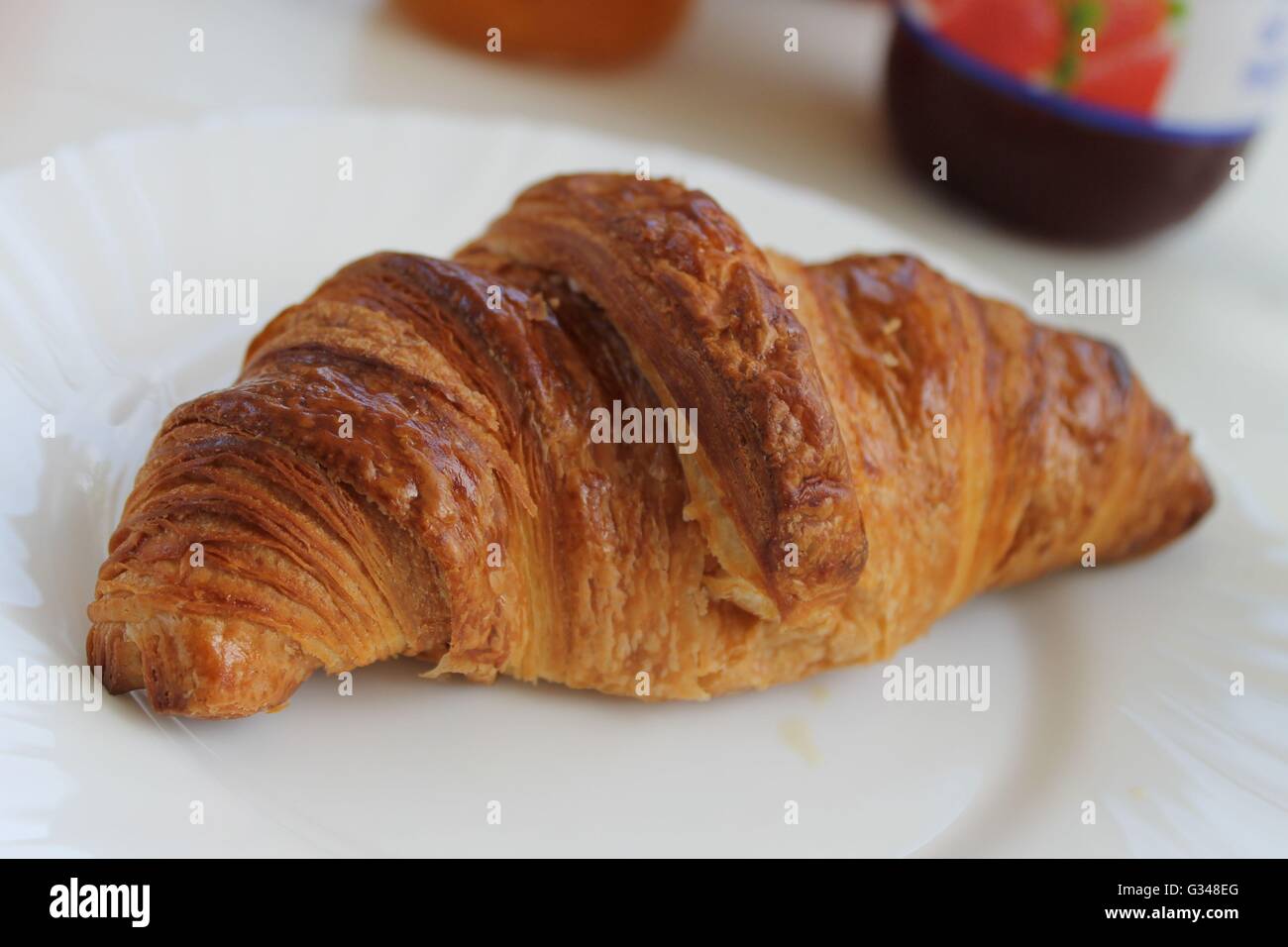 Freshly baked croissant, French breakfast, baked goods Stock Photo