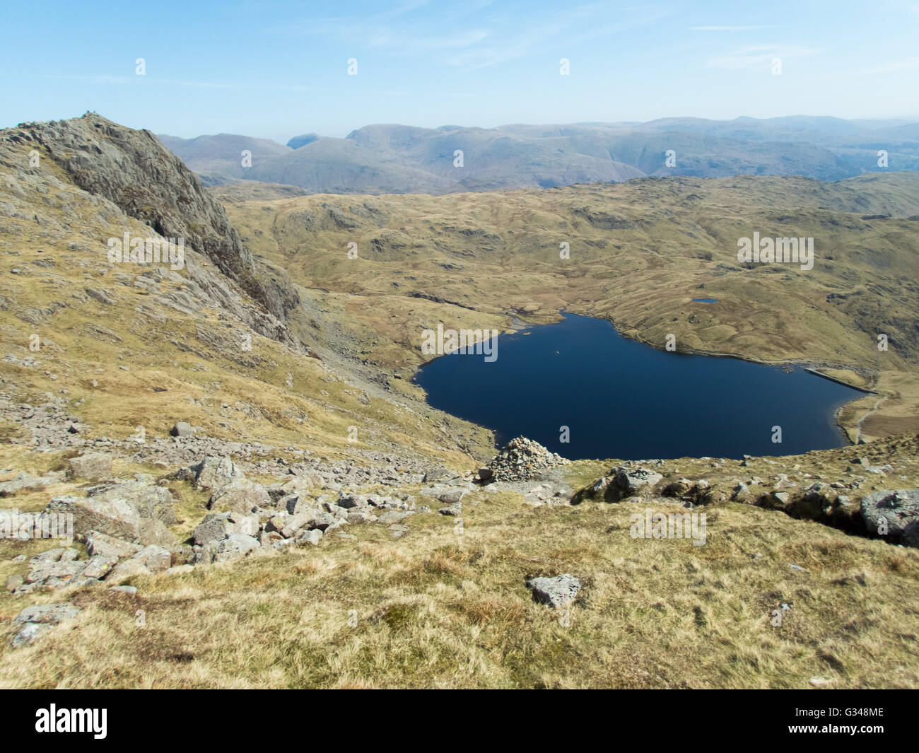 Pavey Ark above Stickle Tarn high above Great Langdale in the Lake District National Park Stock Photo