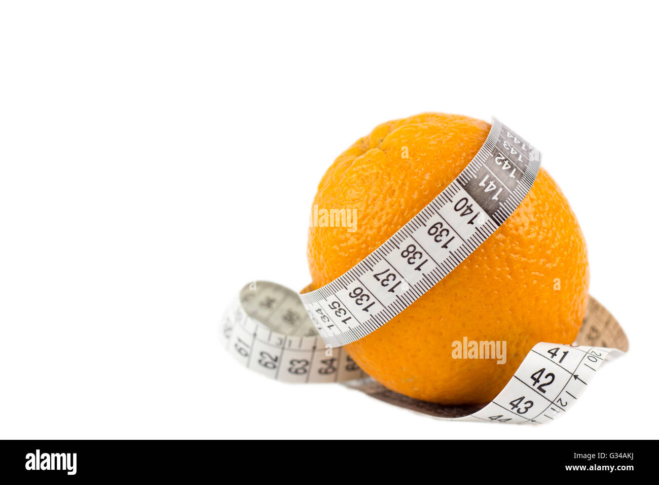 Orange with measuring tape isolated over white background Stock Photo