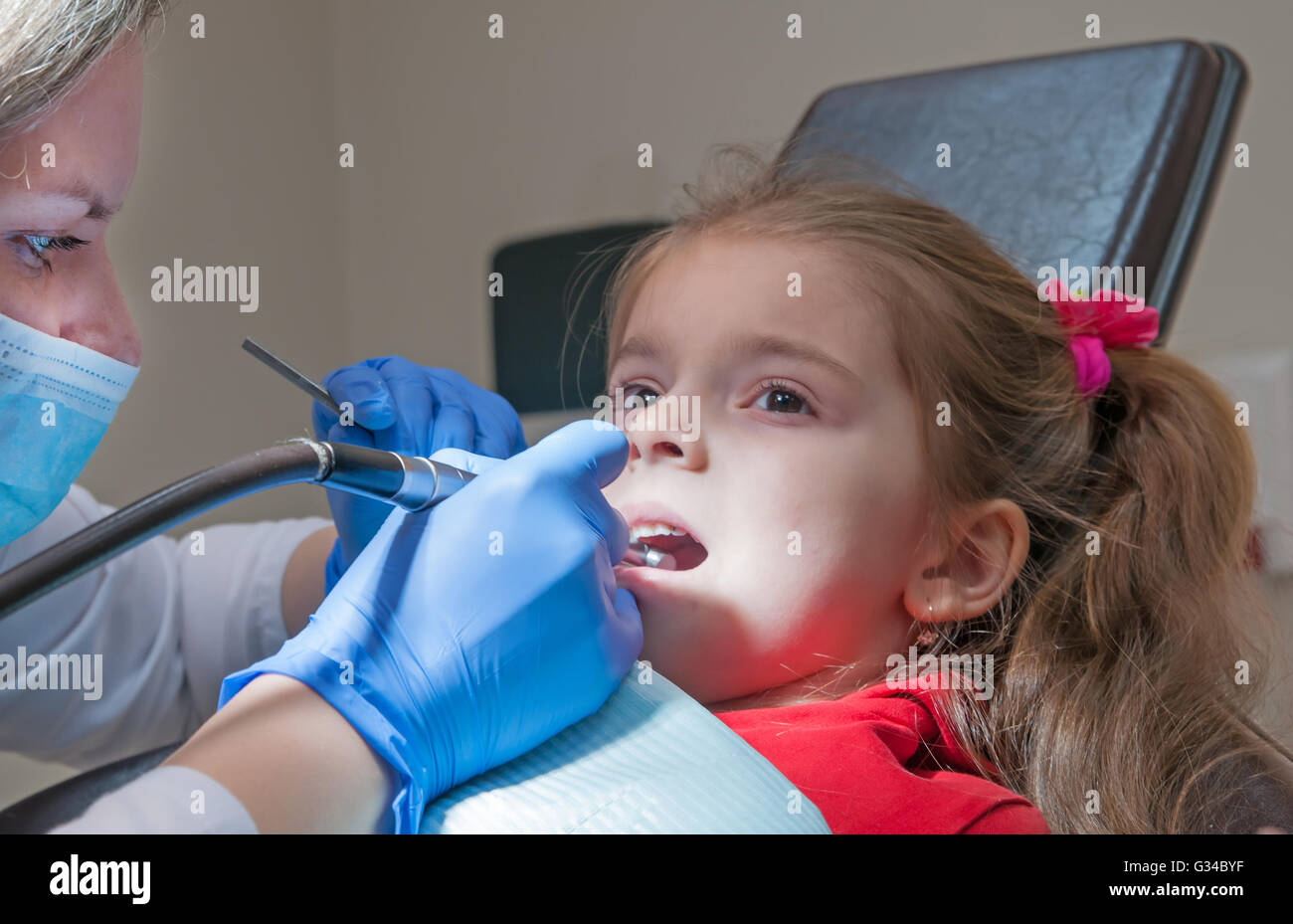 modern dental clinic, young dentist working Stock Photo Alamy