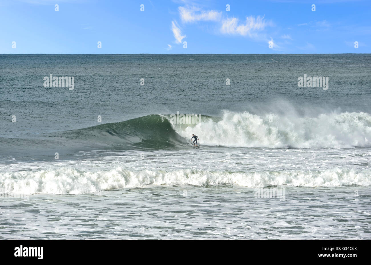 Surfer on Bombo Beach, Kiama, Illawarra Coast, New South Wales, Australia Stock Photo