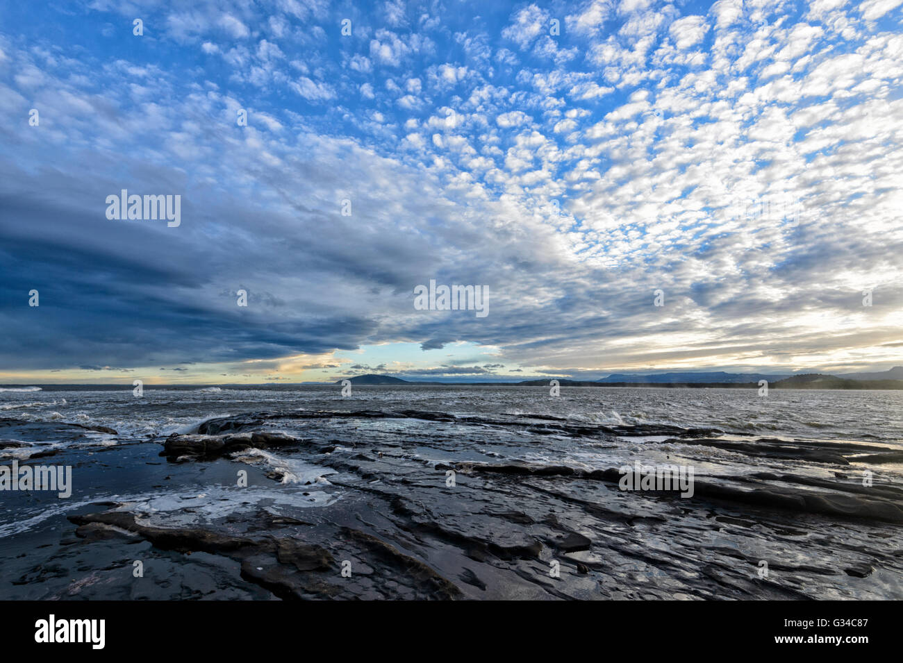 Mackerel Sky over Gerroa headland, Illawarra Coast, New South Wales, Australia Stock Photo