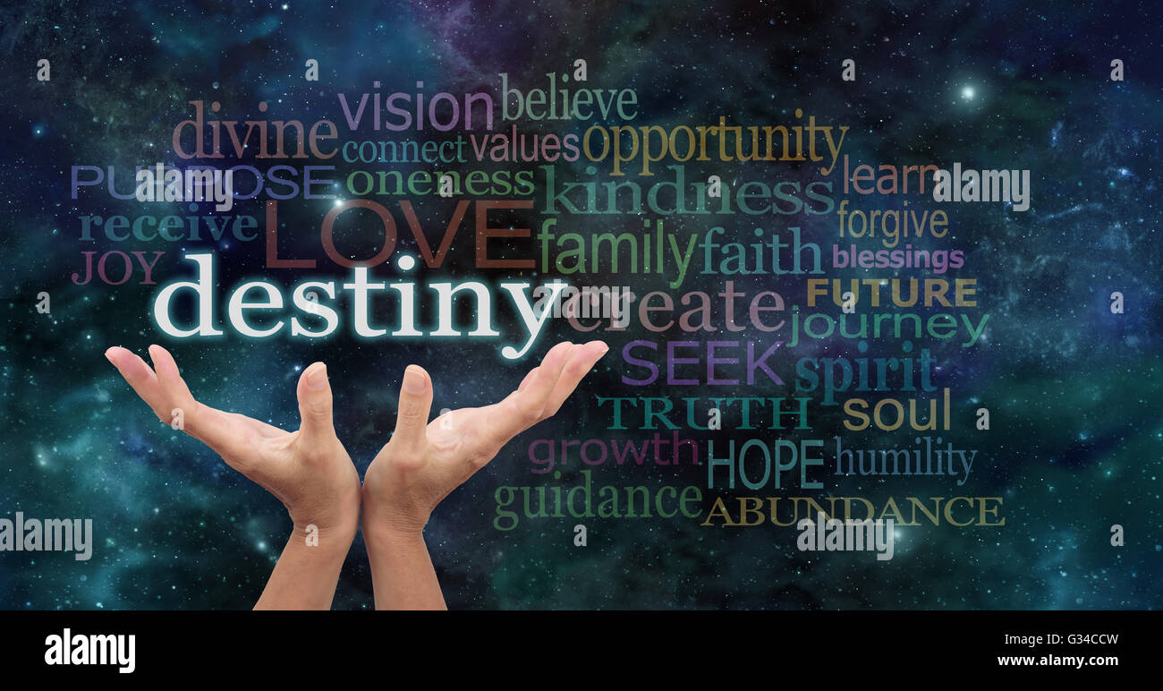 Female hands reaching up into the night sky with the word 'destiny' floating above, surrounded by a word cloud of wise words Stock Photo