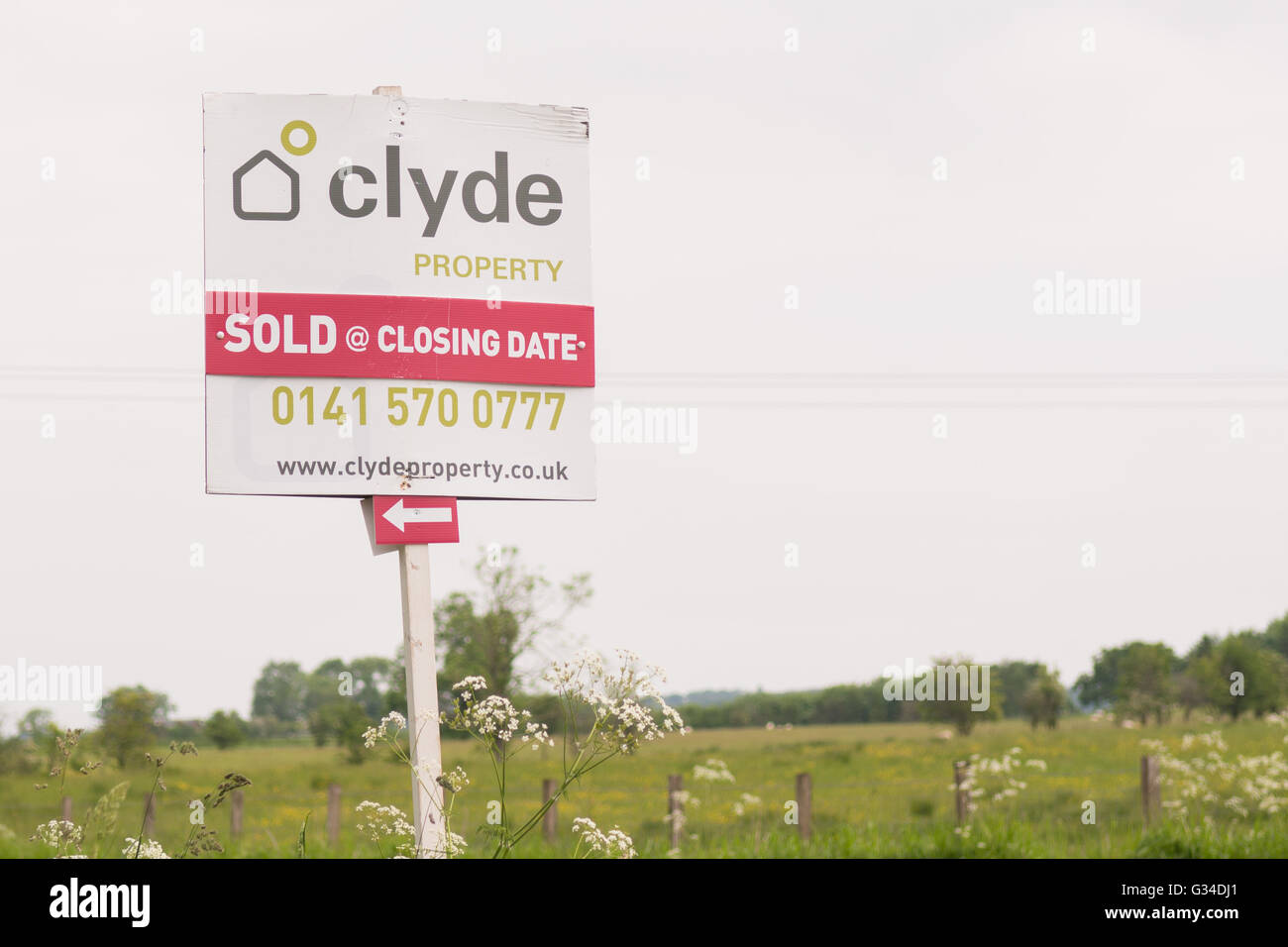Sold at Closing Date estate agent for sale board illustrating the Scottish House buying system which differs from rest of uk Stock Photo
