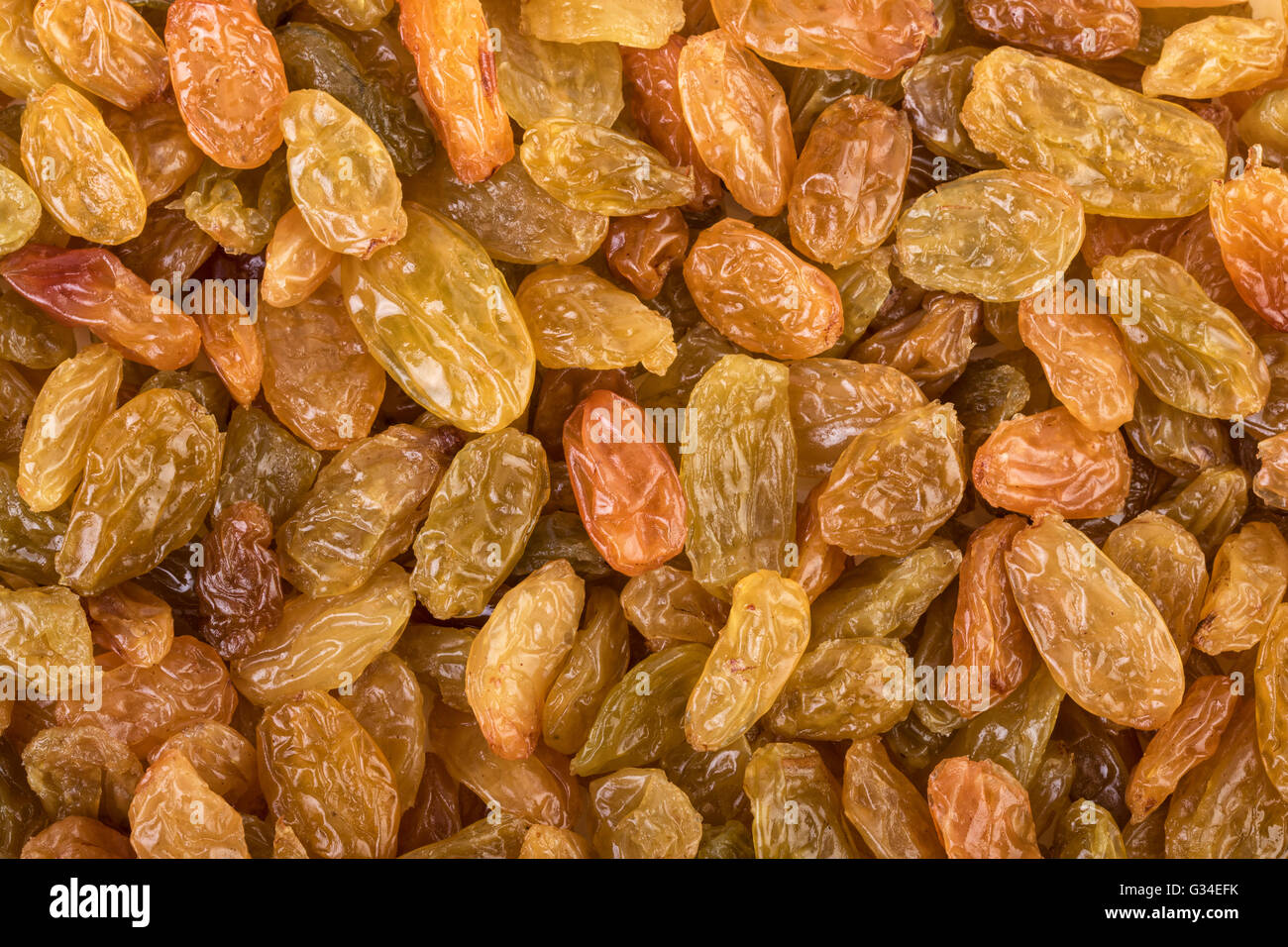Raisins sultanas background. Dried grapes background. Closeup. Stock Photo