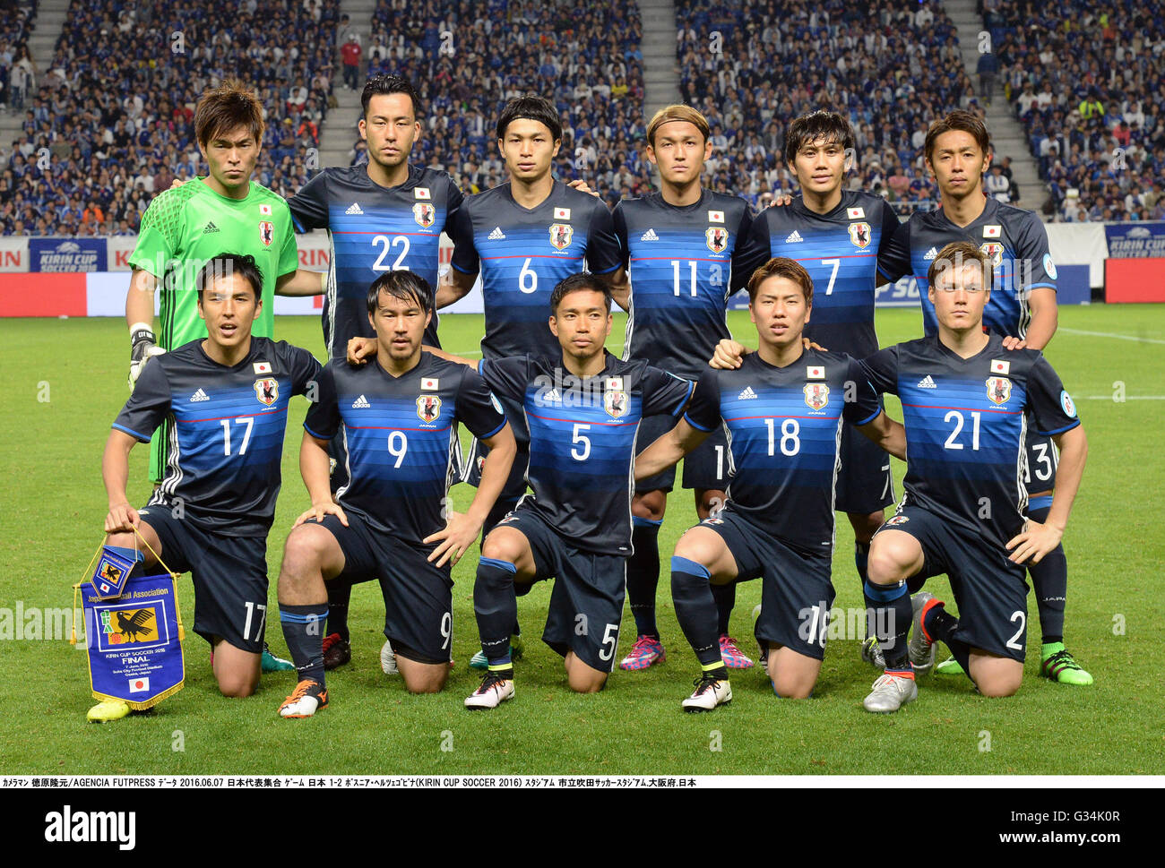 Osaka, Japan. 7th June, 2016. Japan team group line-up (JPN) Football/Soccer : Japan team group (L-R) Shusaku Nishikawa, Maya Yoshida, Masato Morishige, Takashi Usami, Yosuke Kashiwagi, Hiroshi Kiyotake, front; Makoto Hasebe, Shinji Okazaki, Yuto Nagatomo, Takuma Asano, Gotoku Sakai pose before the KIRIN Cup Soccer 2016 final match between Japan 1-2 Bosnia-Herzegovina at Suita Stadium in Osaka, Japan . © Takamoto Tokuhara/AFLO/Alamy Live News Stock Photo