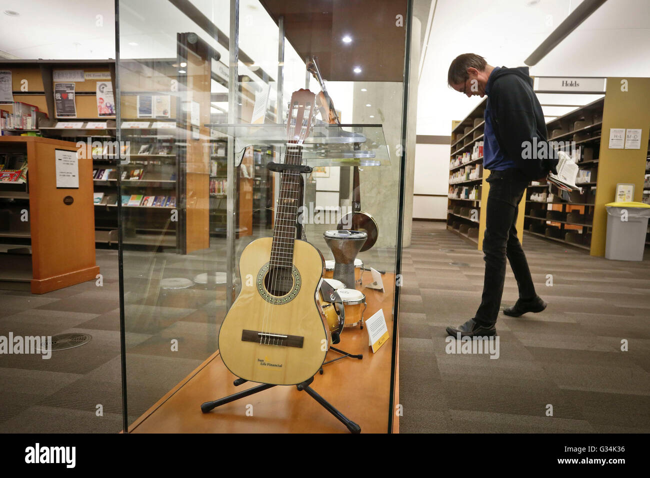 Vancouver, Canada. 7th June, 2016. A resident looks at instruments displayed at Vancouver public