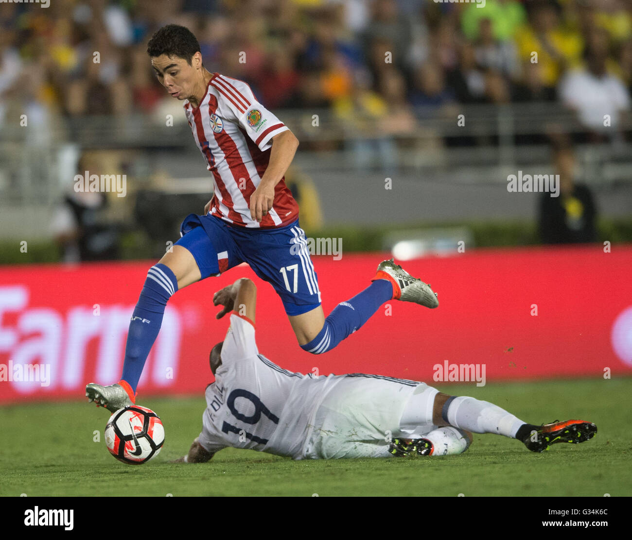 Pasadena, USA. 7th June, 2016. Paraguay's Miguel Almiron (top) breaks through during the Copa America Centenario Group A match between Colombia and Paraguay at Rose Bowl Stadium in Pasadena, California, the United States, June 7, 2016. © Yang Lei/Xinhua/Alamy Live News Stock Photo